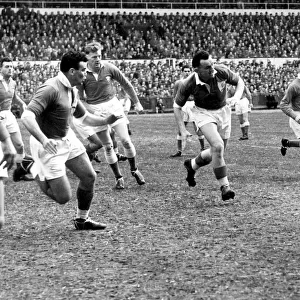 JBG Thomas Collection - Wales v France, Cardiff 1956. Cliff Morgan kicking the ball