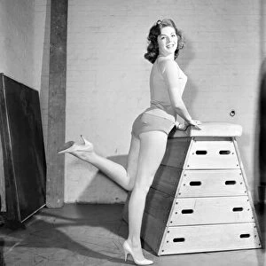 Jean Ryder seen here exercising on a wooden horse. 1959