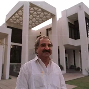 Jehangir Monnoo multi millionaire standing outside his mansion in Lahore where Princess