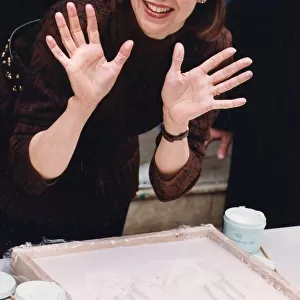 Jenny Agutter preserving her hand prints in cement - 27 / 02 / 1992