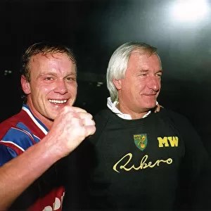 Jeremy Goss Norwich City footballer celebrates with manager Mike Walker after beating