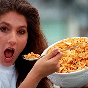 Jet from the tv programme Gladiators eating a bowl of cornflakes with a spoon