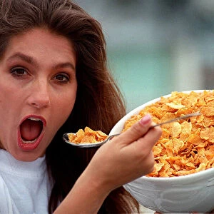 Jet from the tv programme Gladiators eating a bowl of cornflakes spoon