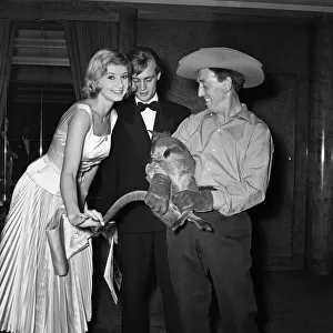 Jill Ireland and husband David McCallum with a wallaby at the premiere of