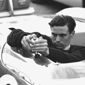 Jim Clark adjusts the mirror on his Lotus 23 before the start of the Autosport 3 hour Jim Clark adjusts the mirror on his Lotus 23 before the start of the Autosport 3 hour