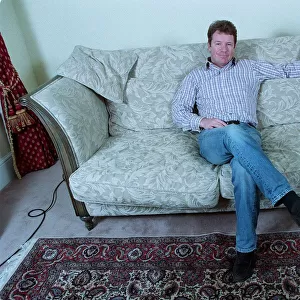 Jim Davidson Comedian / TV Presenter October 1998 Sitting on sofa at home