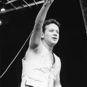 Jim Kerr, lead singer of the rock group Simple Minds entertains the crowd at the groups Jim Kerr, lead singer of the rock group Simple Minds entertains the crowd at the groups