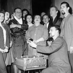 Jimmy Hill of Coventry City seen here with Sid James and the cast of Puss in Boots record