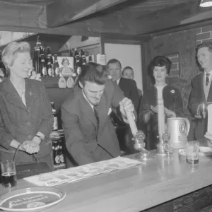 Jimmy Hill tries his hand at pulling a pint of beer at the official opening of The Rose Jimmy Hill tries his hand at pulling a pint of beer at the official opening of The Rose