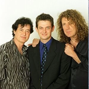 Jimmy Page former lead guitarist of the pop group Lead Zeppelin with Robert Plant former