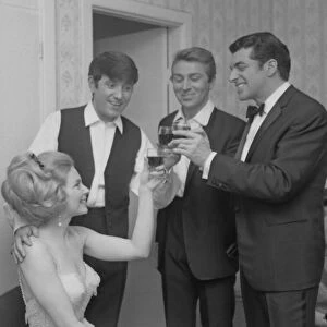 Jimmy Tarbuck, Des O Connor and Frankie Vaughan enjoy a celebratory drink with French