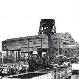 Jimmy Weatherby (left) and Alan Nelson unload equipment salvaged from Elemore Colliery