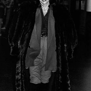 Joan Collins Actress arrives at Gatwick from the USA dressed for winter in January 1989