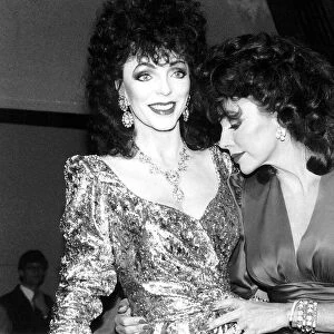 Joan Collins Actress holding waxwork model of herself March 1989