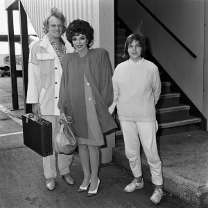 Joan Collins arrives at LAP from Los Angeles with her boyfriend Peter Holm Joan Collins arrives at LAP from Los Angeles with her boyfriend Peter Holm