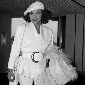 Joan Collins British actress arriving at Heathrow from Los Angeles in January 1988