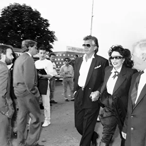 Joan Collins and George Hamilton arrive at Wembley London for the Michael Jackson concert