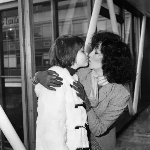 Joan Collins at Heathrow Airport with her daughter Katyana after a holiday in the Bahamas Joan Collins at Heathrow Airport with her daughter Katyana after a holiday in the Bahamas