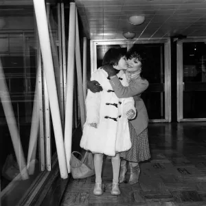 Joan Collins at Heathrow Airport with her daughter Katyana after a holiday in the Bahamas Joan Collins at Heathrow Airport with her daughter Katyana after a holiday in the Bahamas