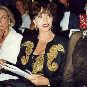 Joan Collins at Valentino fashion show wearing jewelled suit 27 / 07 / 1989