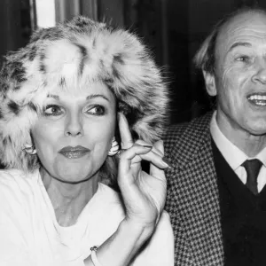 Joan Collins wearing fur hat with Roald Dahl at TV press conference - March 1979