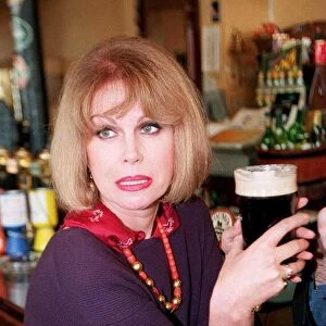 Joanna Lumley actress swops the bolly for a pint today to launch a new pub
