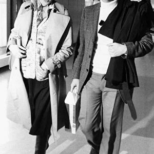 Joanna Lumley and Dennis Waterman at airport 1977