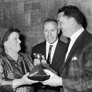 Jock Stein receives a trophy from Mrs Bessie Braddock for the manager of the year award