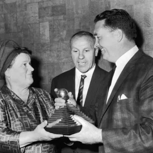 Jock Stein receives a trophy from Mrs Bessie Braddock for the manager of the year award