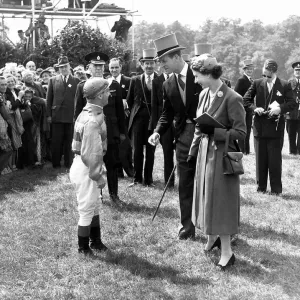 Jockey Gordon Richards is congratulated by Queen Elizabeth II after winning the Epsom Jockey Gordon Richards is congratulated by Queen Elizabeth II after winning the Epsom