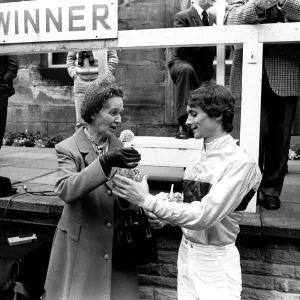 Jockey Walter Swinburn receives a winners trophy at Gosforth Park Racecourse, Newcastle Jockey Walter Swinburn receives a winners trophy at Gosforth Park Racecourse, Newcastle