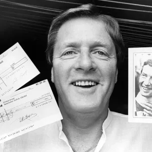 Joe Gaskin holding cheques Print, 24th April 1982