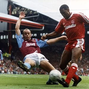 John Barnes (R) playing for Liverpool against Aston Villa 1990