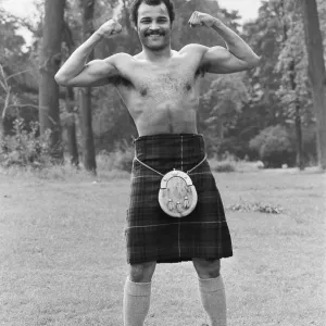 John Conteh gets the Scottish flavour on Parliament Hill Fields today watched by curious John Conteh gets the Scottish flavour on Parliament Hill Fields today watched by curious