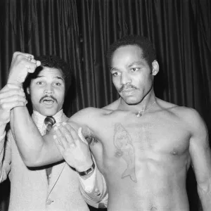 A Print of John Conteh facing Leonadro Rodgers in London A Print of John Conteh facing Leonadro Rodgers in London