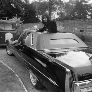 John Entwistle and Keith Moon of the rock group The Who show off their new cars John Entwistle and Keith Moon of the rock group The Who show off their new cars