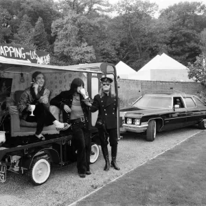 John Entwistle and Keith Moon of the rock group The Who show off their new cars John Entwistle and Keith Moon of the rock group The Who show off their new cars