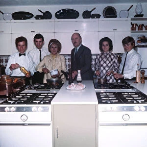 John and Fanny Cradock with TV kitchen assistants in their new home near Watford