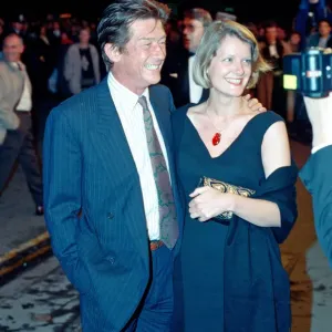 John Hurt and his partner Jo Dalton arrive at The Odeon Leicester Square