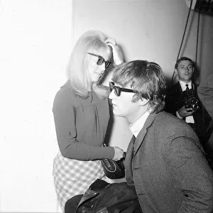 John Lennon and Cynthia Lennon at London Airport, 2 July 1964