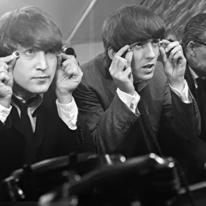 John Lennon and George Harrison with glass eyes when the Beatles