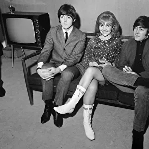 John Lennon and Paul McCartney with Lulu sitting on a sofa during the making of 55 minute