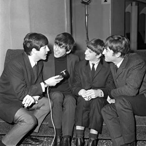 John Lennon, Paul McCartney, Ringo Starr, George Harrison The Beatles play at
