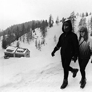 John Lennon and wife Cynthia Lennon in St Moritz on a Skiing Holiday with George Martin