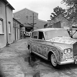 John Lennons psychedelically painted Rolls-Royce leaves the car paint shop of J. P