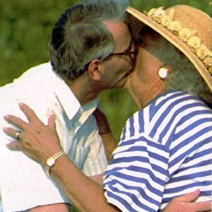 John Major kissing Babara Bush on the arrival of the Major family in USA 1991