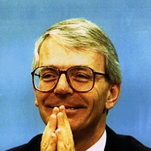 John Major Prime Minister appears to be praying for guidance at the Conservative Party