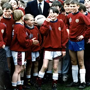 John Major Prime Minister with young footballers at Heart of Midlothian football ground