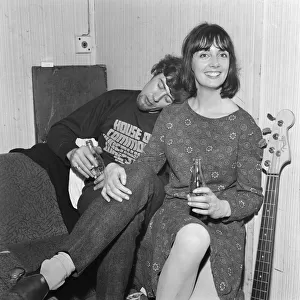 John Mayall of the Bluesbreakers, with wife Pamela, rests in the band room between