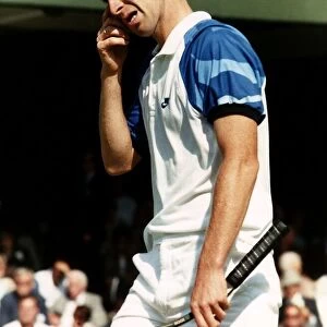 John McEnroe tennis champion roared into the third round at Wimbledon 89 after beating